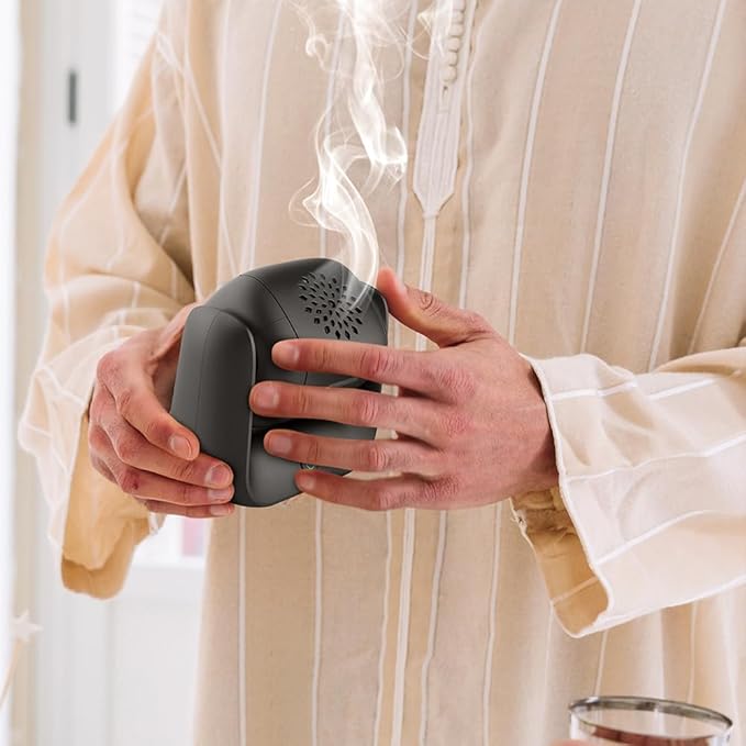 مبخرة بخور كهربائية دوّارة